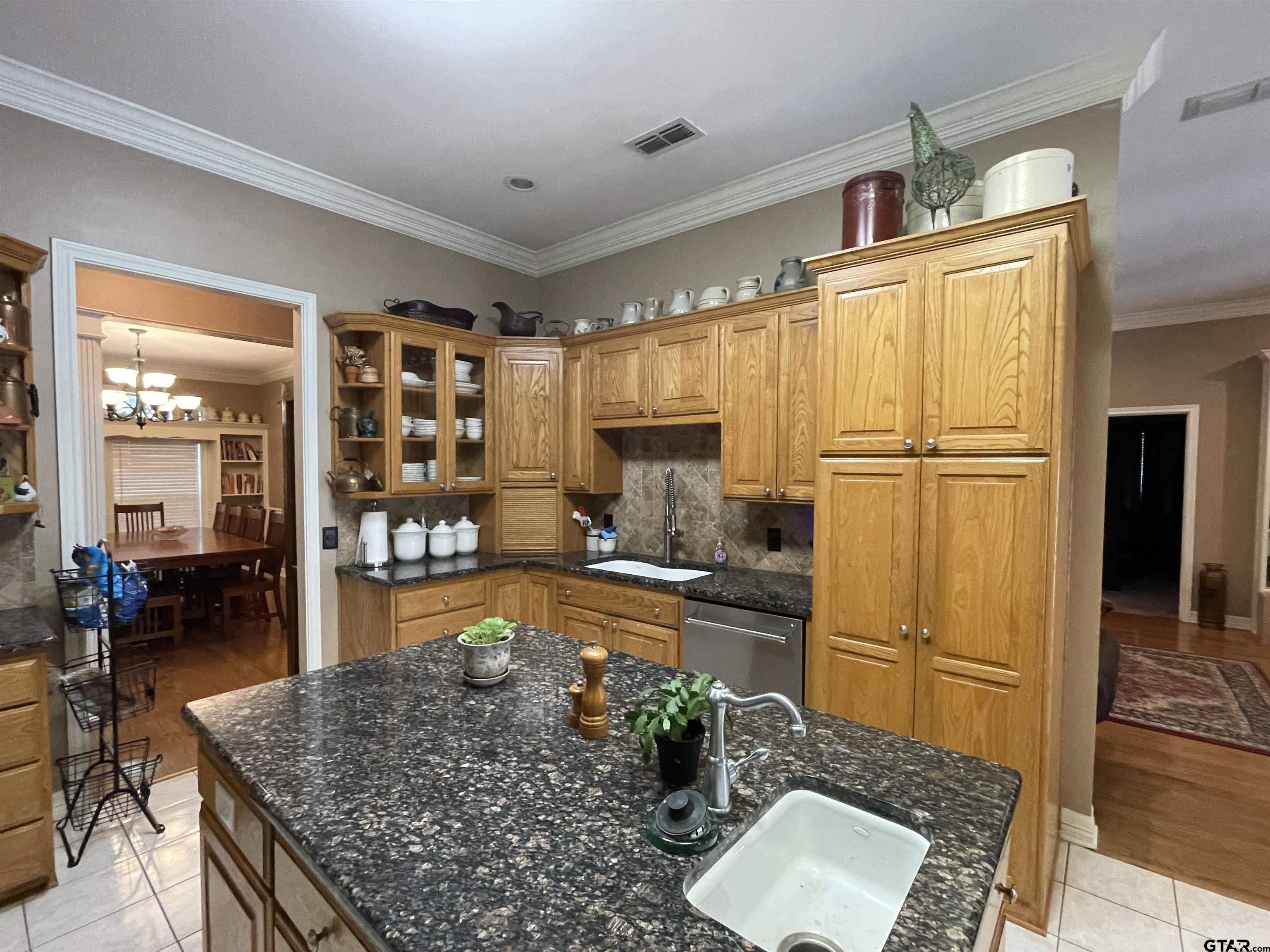 3617 Flagstone Drive Tyler, TX 75707 - Photo 22 of 45 a kitchen with refrigerator and window