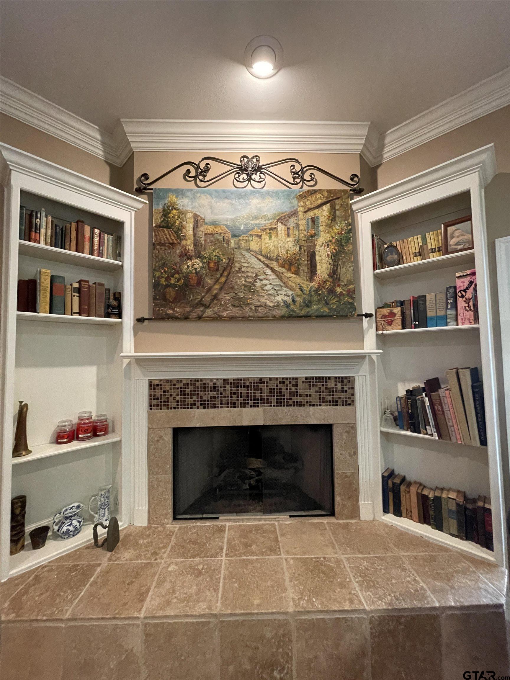 3617 Flagstone Drive Tyler, TX 75707 - Photo 27 of 45 a room with fireplace and cabinets