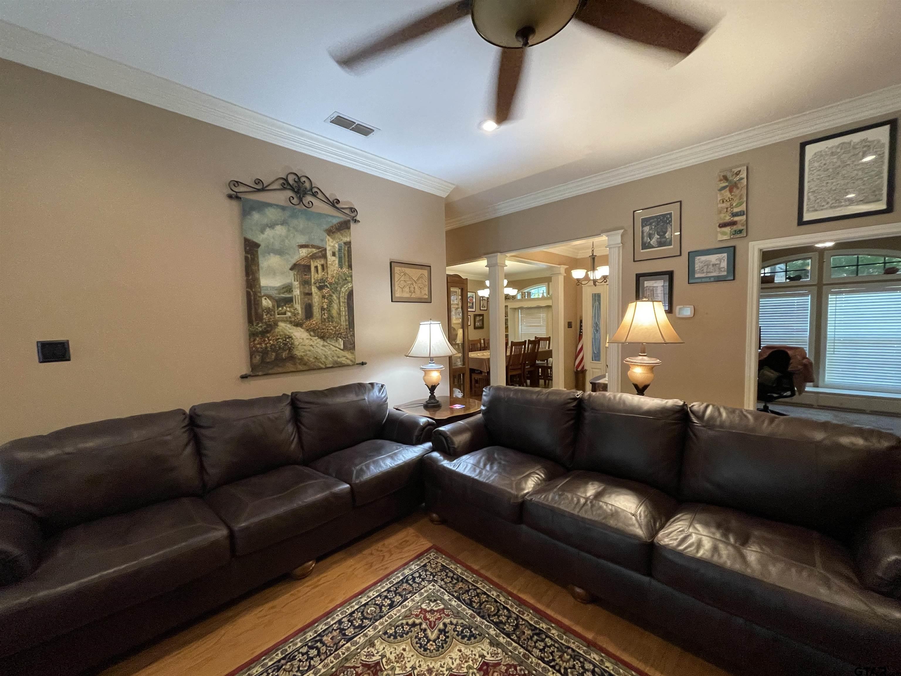 3617 Flagstone Drive Tyler, TX 75707 - Photo 28 of 45 a living room with furniture and a rug