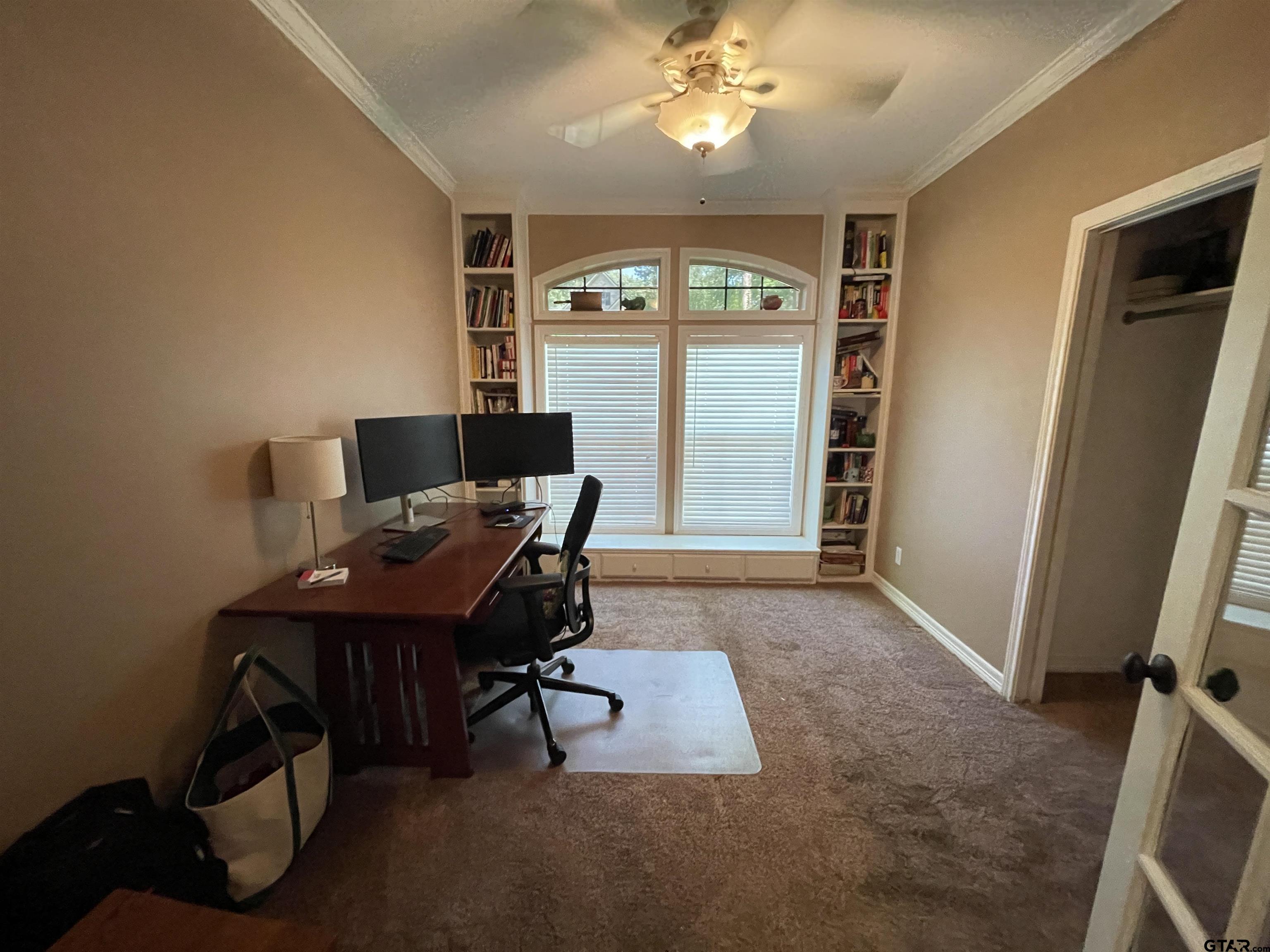3617 Flagstone Drive Tyler, TX 75707 - Photo 29 of 45 a view of a workspace with furniture and a window