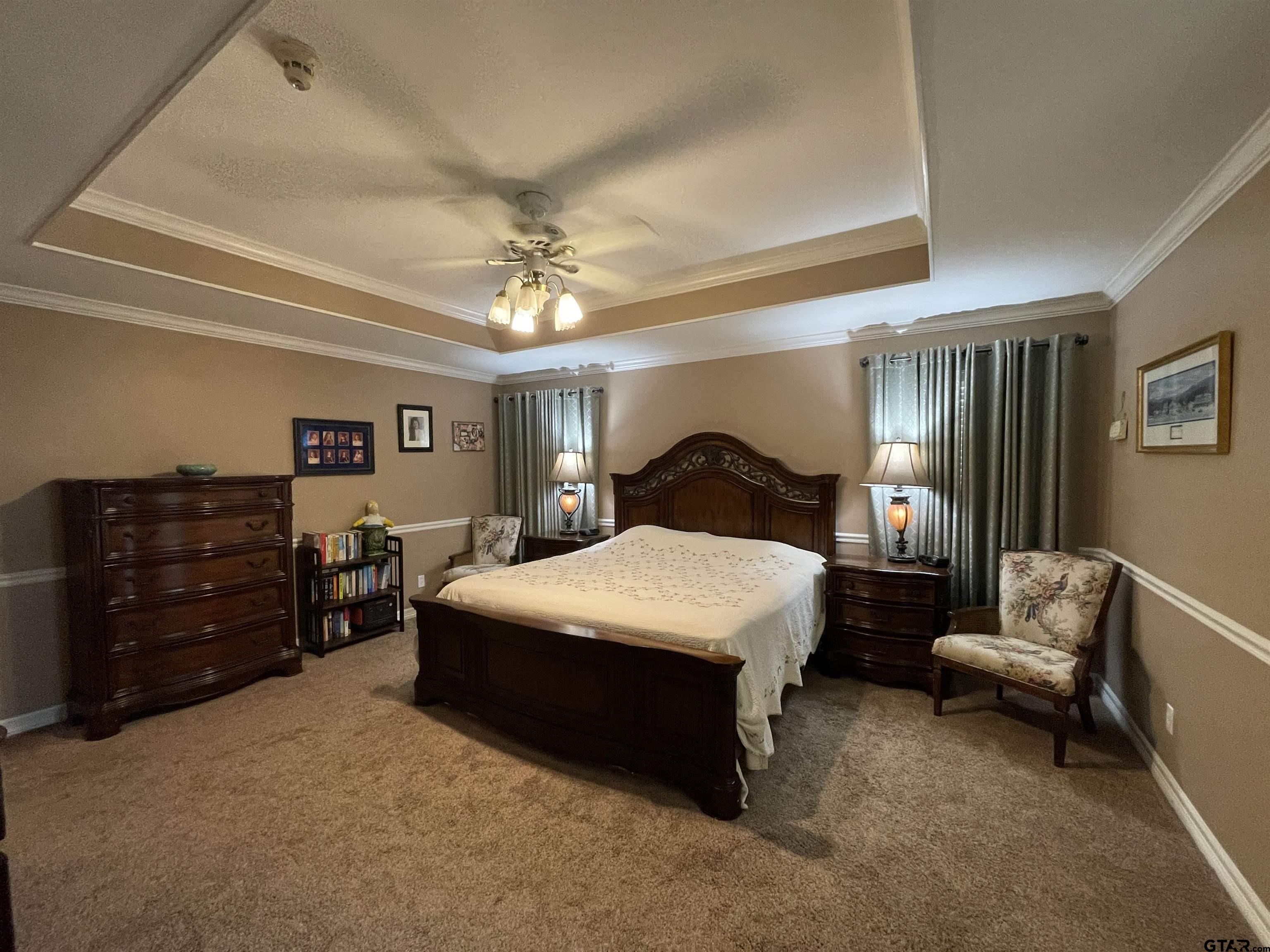 3617 Flagstone Drive Tyler, TX 75707 - Photo 36 of 45 a bedroom with a bed and furniture