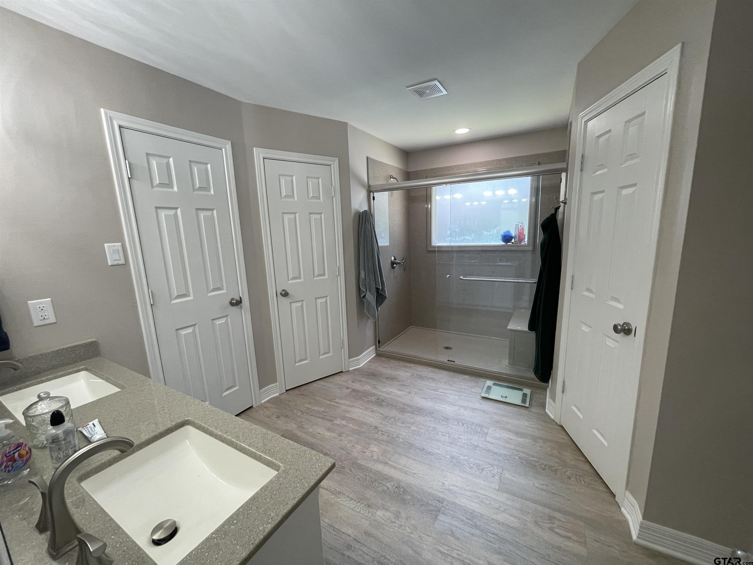 3617 Flagstone Drive Tyler, TX 75707 - Photo 38 of 45 wooden floor & windows in a room