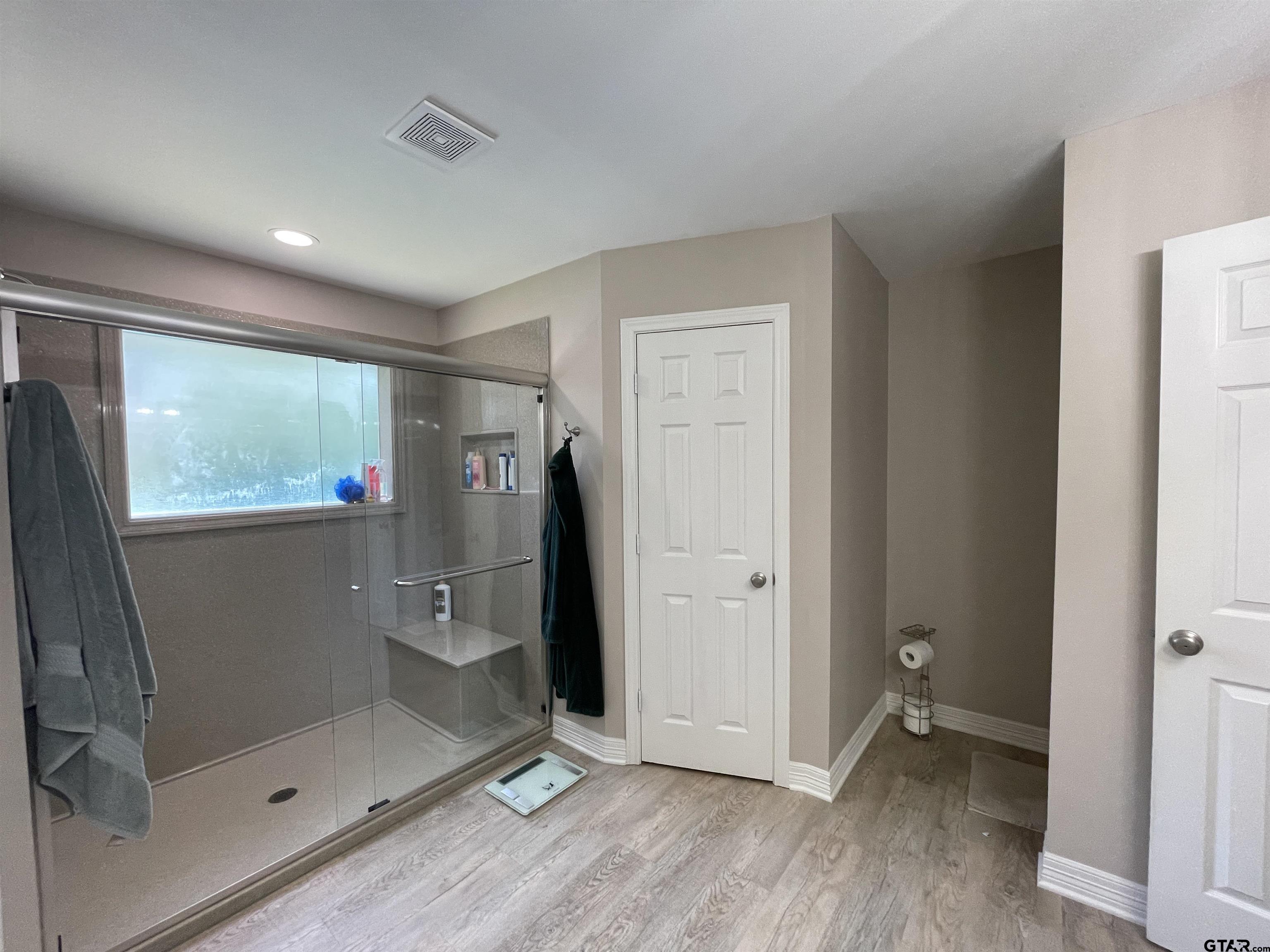 3617 Flagstone Drive Tyler, TX 75707 - Photo 40 of 45 a view of empty room with wooden floor and fan