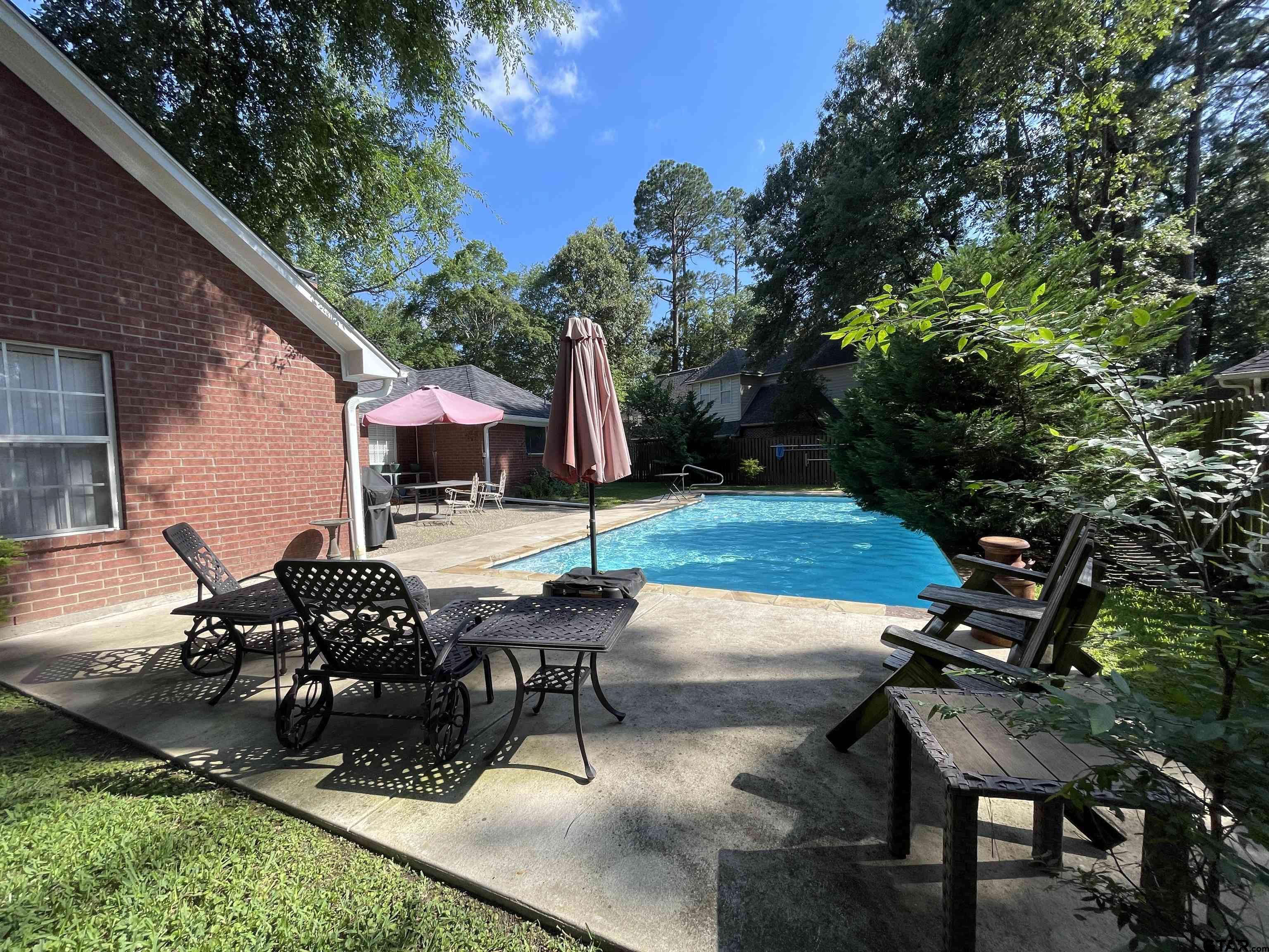 3617 Flagstone Drive Tyler, TX 75707 - Photo 44 of 45 a view of a backyard with sitting area