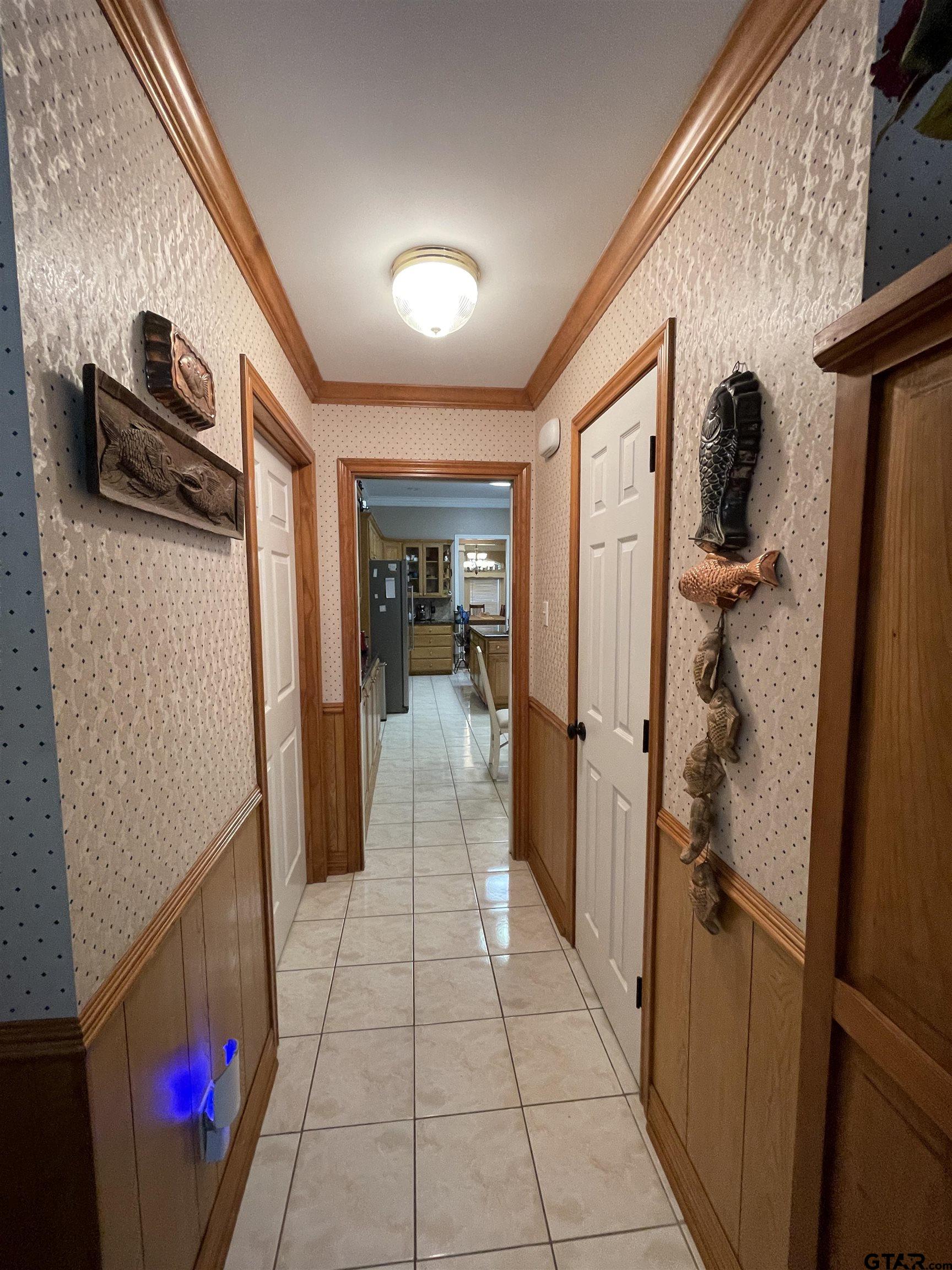 3617 Flagstone Drive Tyler, TX 75707 - Photo 9 of 45 a hallway with a view of living room