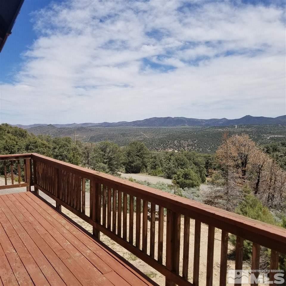 1970 Applegate Road Reno, NV 89521 - Photo 5 of 25 a balcony with wooden floor and mountain view