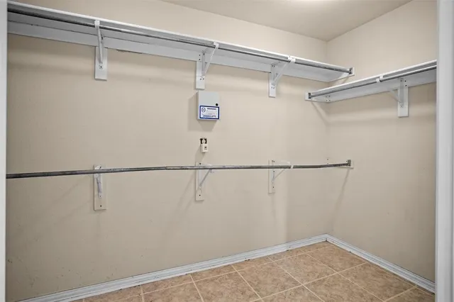 a view of a room with racks on the wall