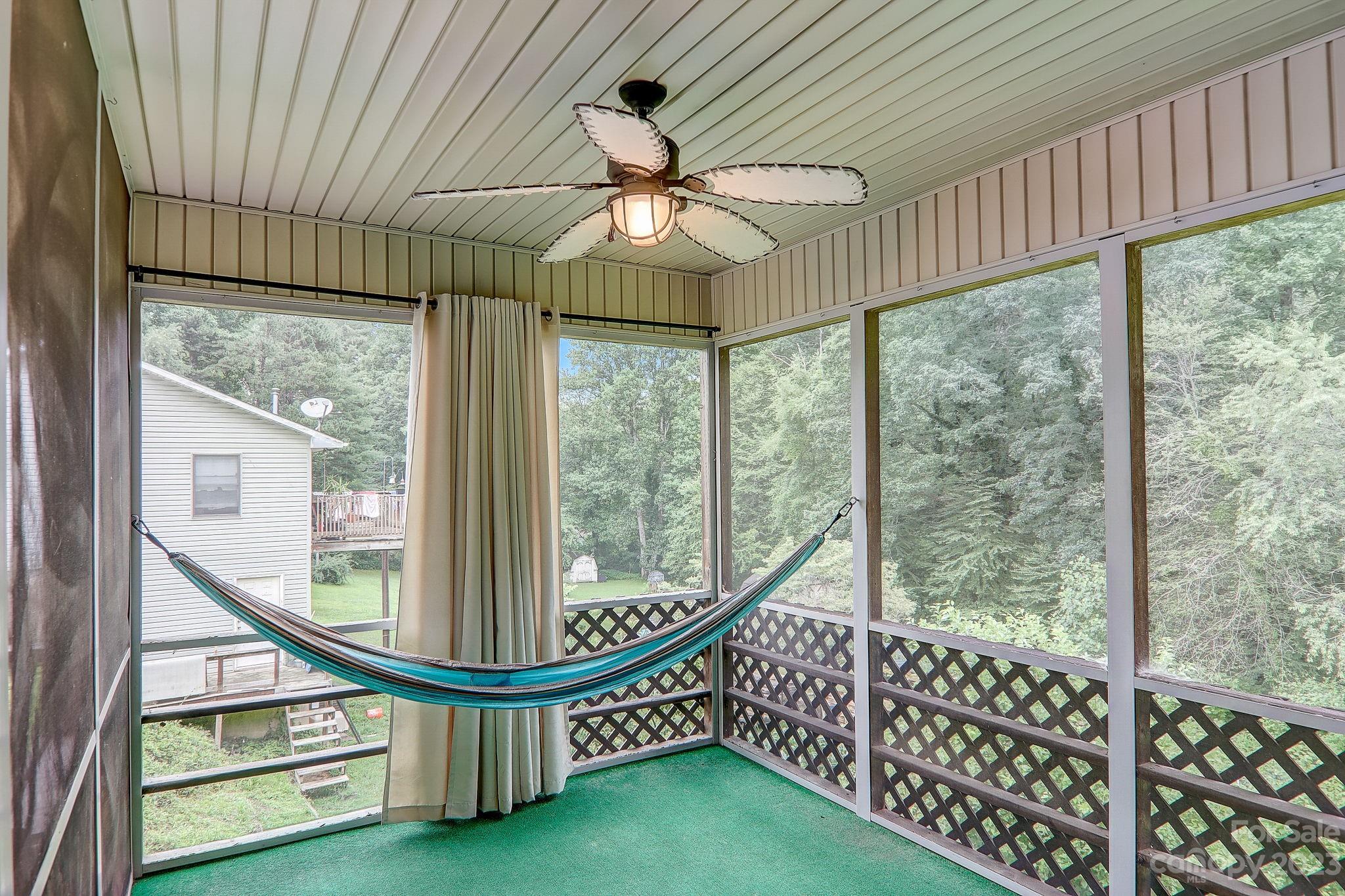 4155 Turnpike Road Horse Shoe, NC 28742 - Photo 35 of 41 a view of a balcony with furniture