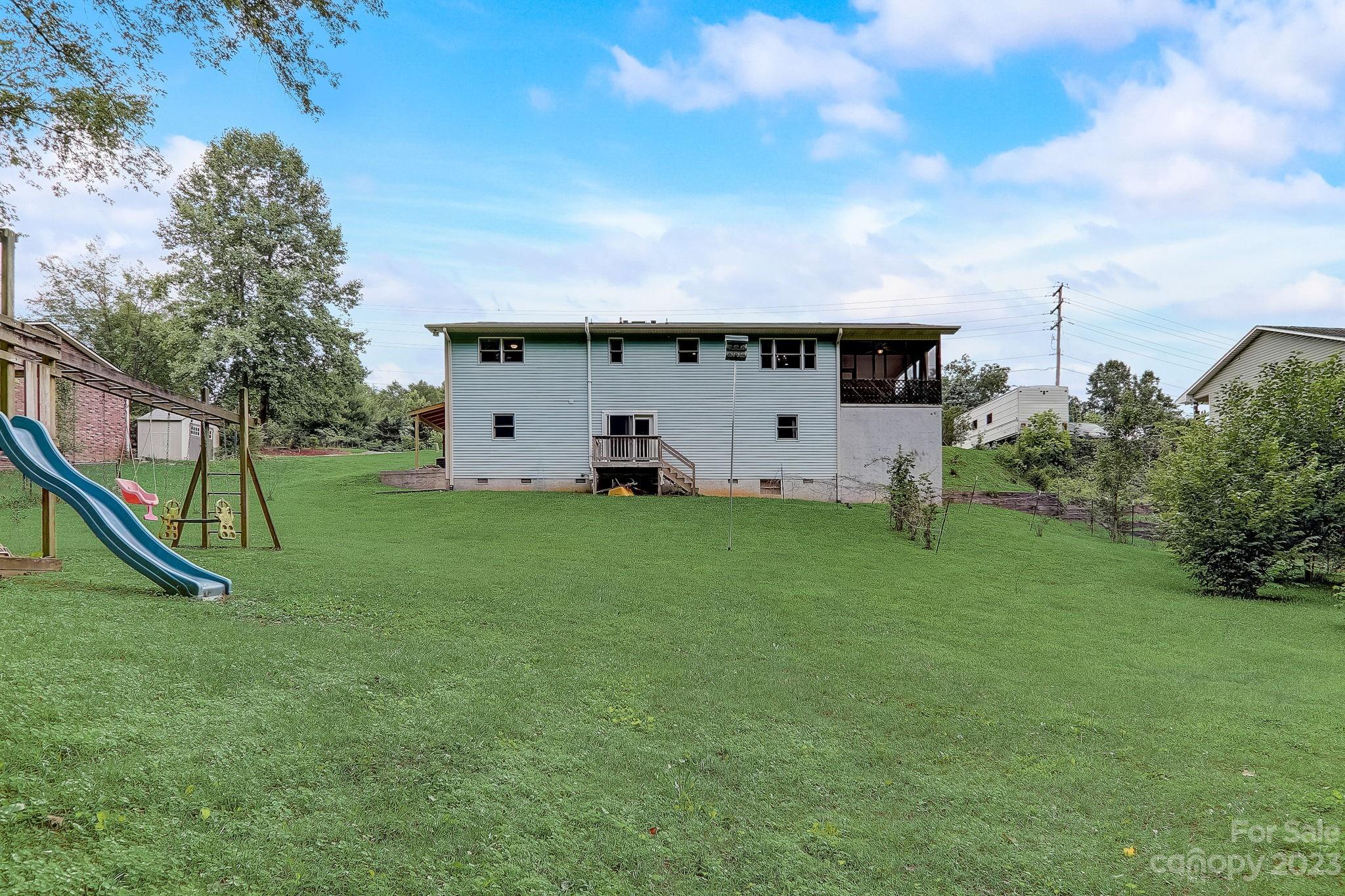 4155 Turnpike Road Horse Shoe, NC 28742 - Photo 39 of 41 a view of a house with backyard