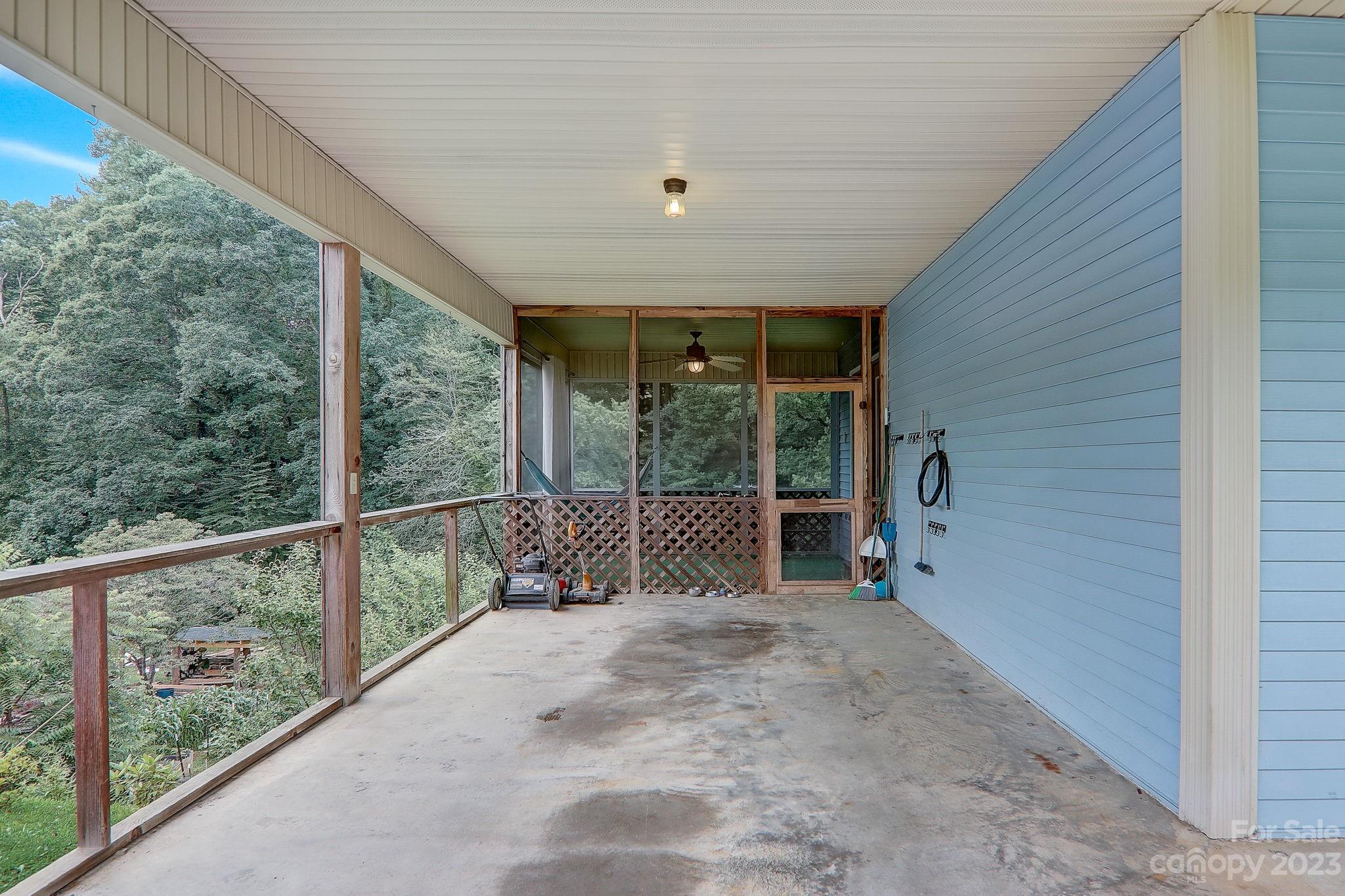 4155 Turnpike Road Horse Shoe, NC 28742 - Photo 4 of 41 a view of a porch