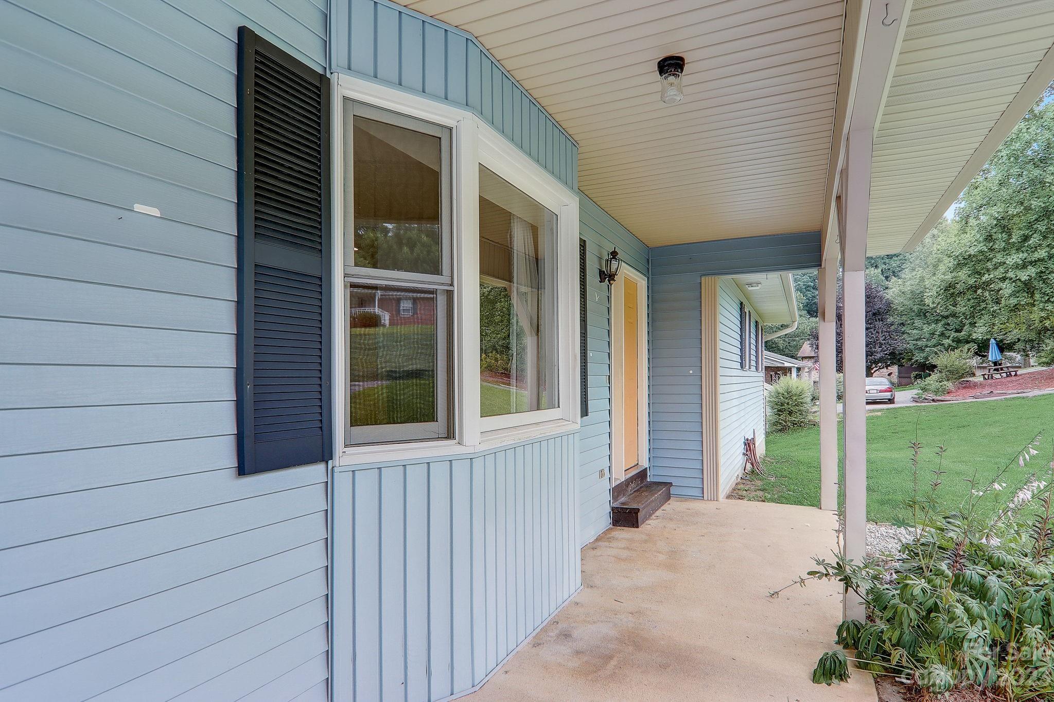4155 Turnpike Road Horse Shoe, NC 28742 - Photo 5 of 41 a front view of a house with a yard