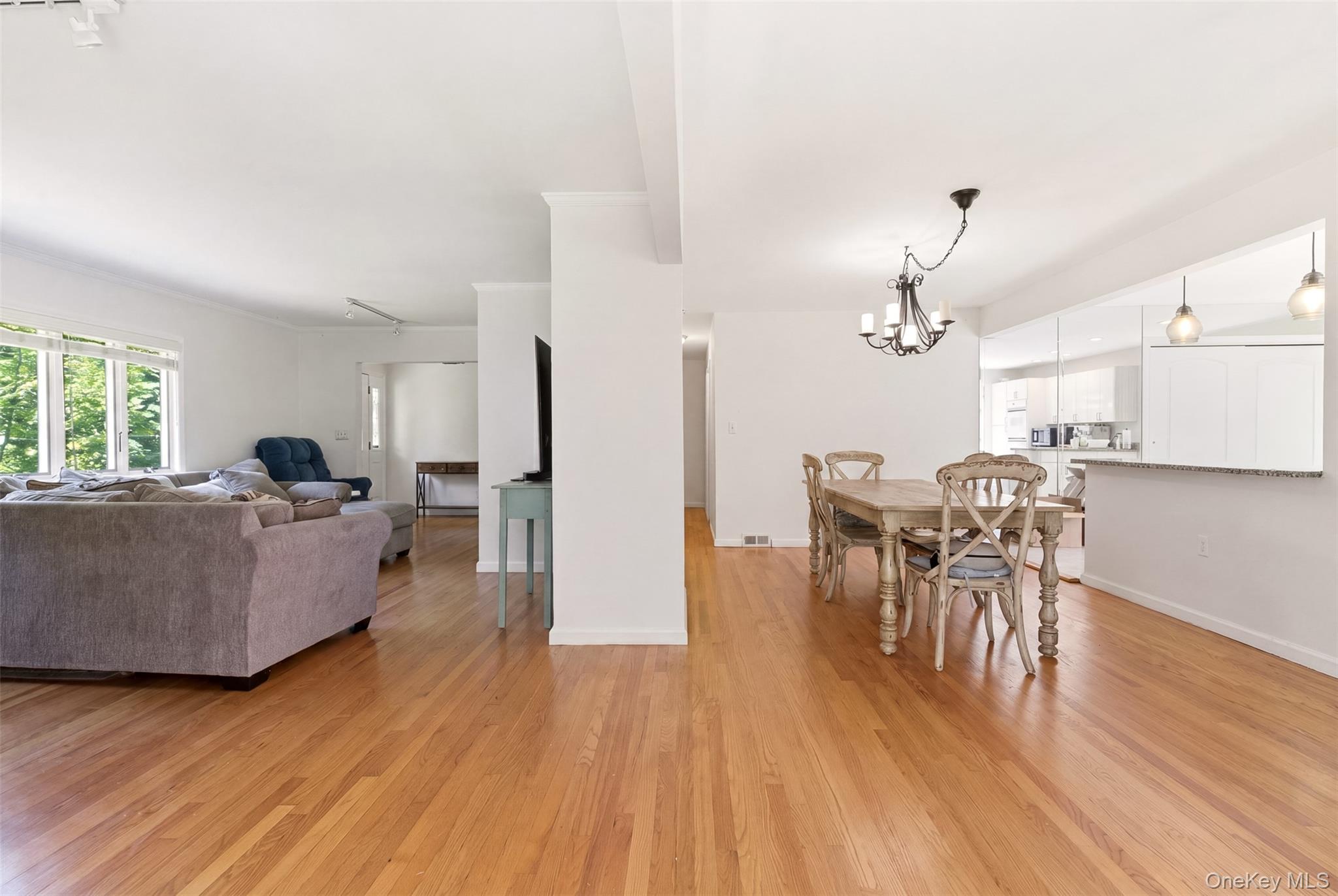 106 Vineyard Road Huntington, NY 11743 - Photo 15 of 25 a living room with furniture and a wooden floor