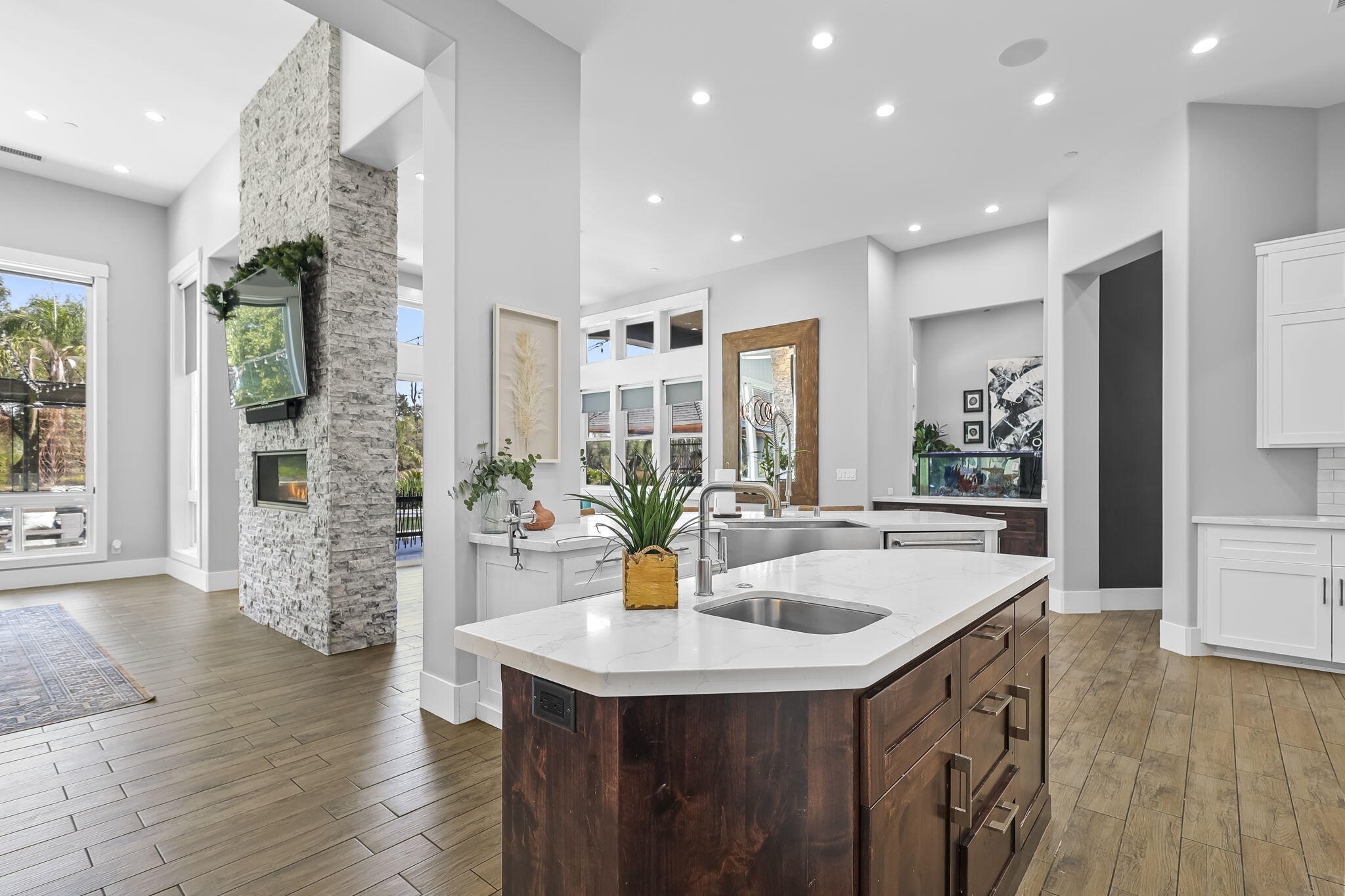 19580 Mockingbird Lane Redding, CA 96002 - Photo 46 of 72 a kitchen with stainless steel appliances granite countertop a sink and a wooden floor