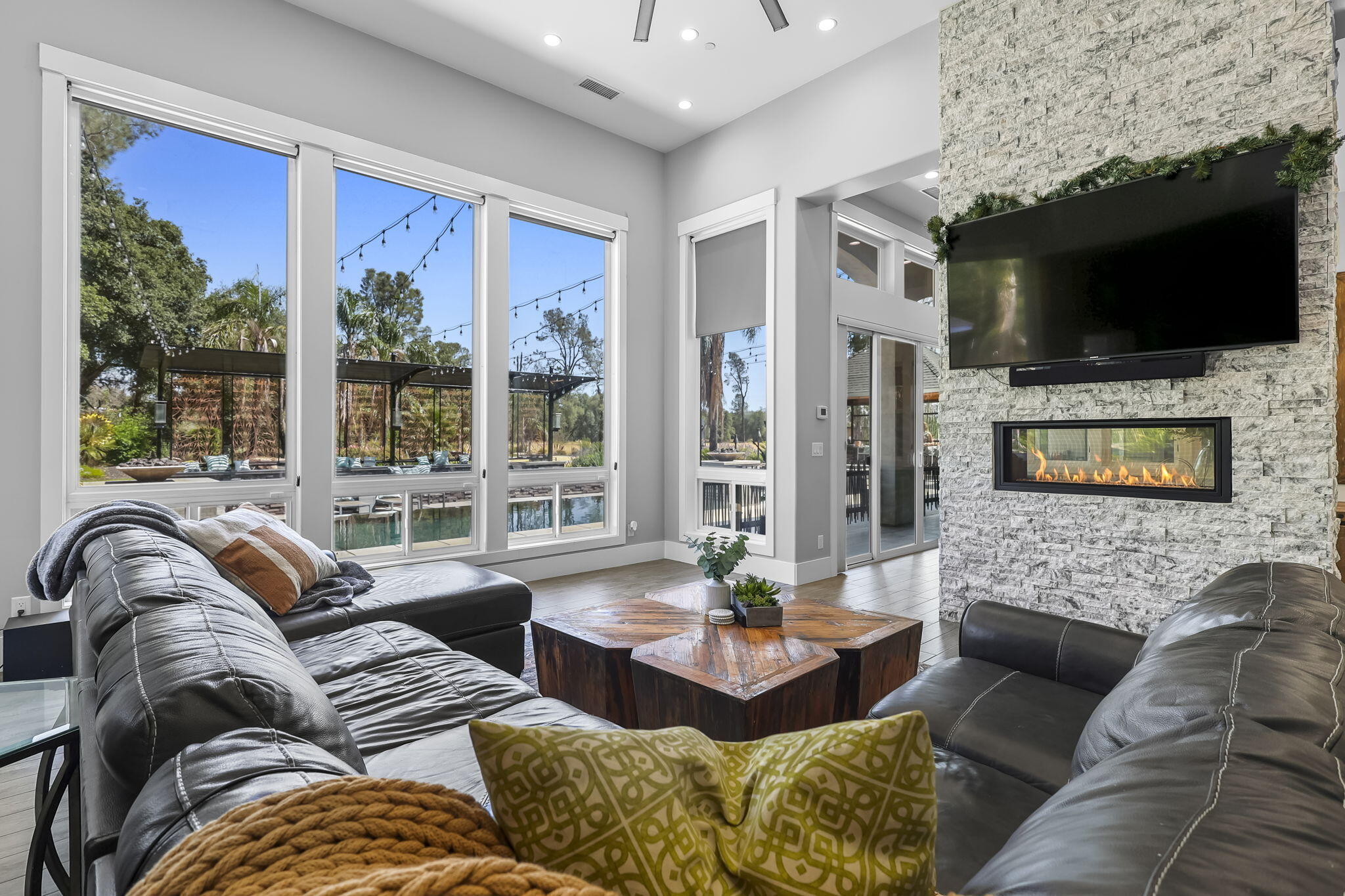 19580 Mockingbird Lane Redding, CA 96002 - Photo 47 of 72 a living room with fireplace furniture and a flat screen tv
