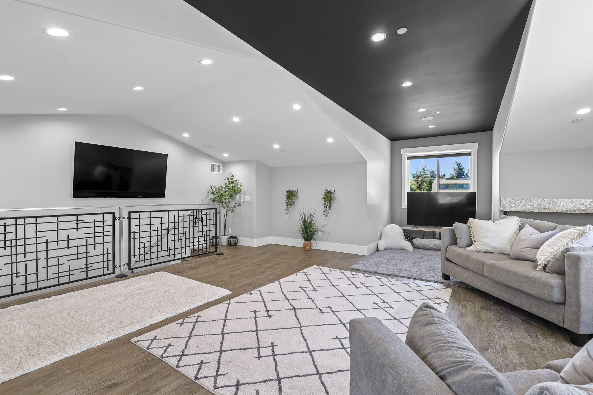 19580 Mockingbird Lane Redding, CA 96002 - Photo 56 of 72 a living room with a couch and a flat screen tv