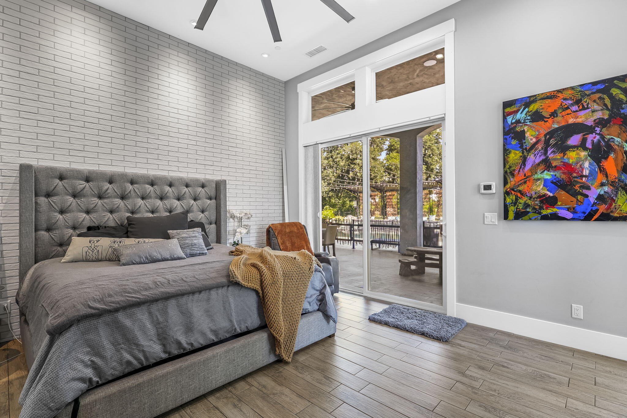 19580 Mockingbird Lane Redding, CA 96002 - Photo 58 of 72 a bedroom with a bed and a couch