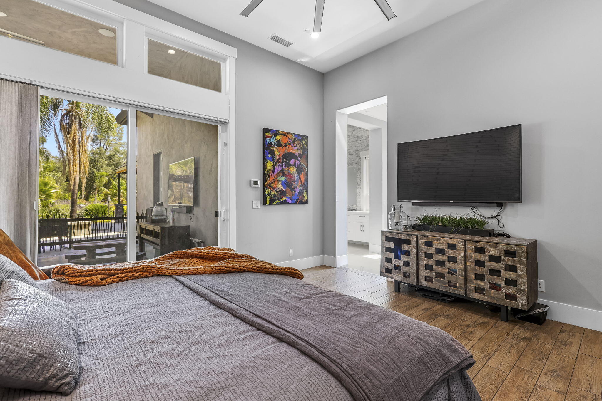 19580 Mockingbird Lane Redding, CA 96002 - Photo 59 of 72 a bedroom with furniture and flat screen tv