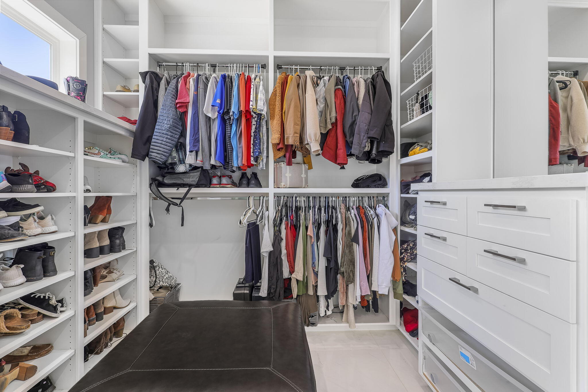 19580 Mockingbird Lane Redding, CA 96002 - Photo 60 of 72 a view of walk in closet with clothes and shoes