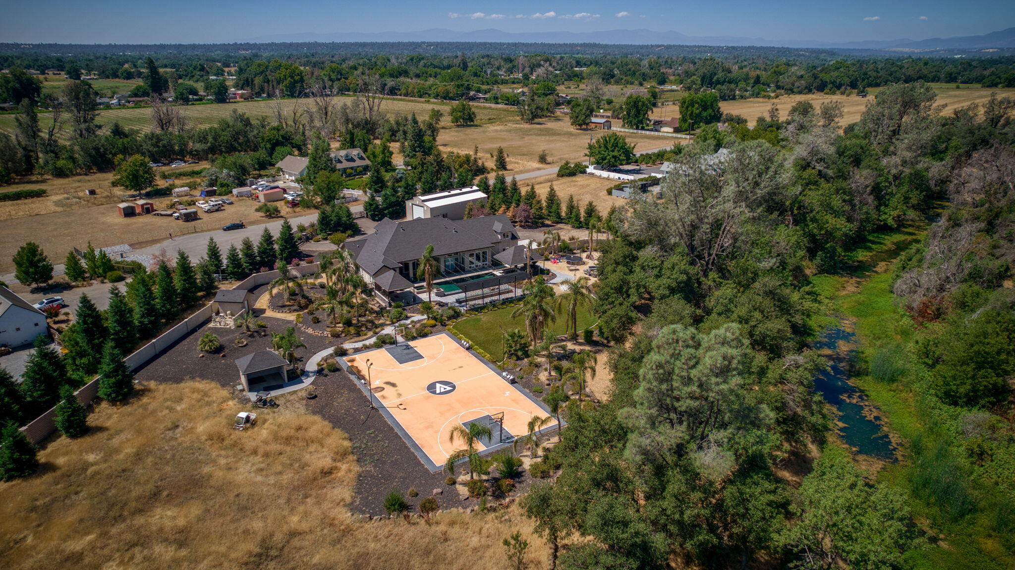 19580 Mockingbird Lane Redding, CA 96002 - Photo 7 of 72 an aerial view of a house with a yard