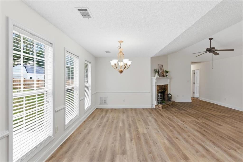 9 Redfern Trail Northeast Rome, GA 30165 - Photo 10 of 19 wooden floor in an empty room with a window