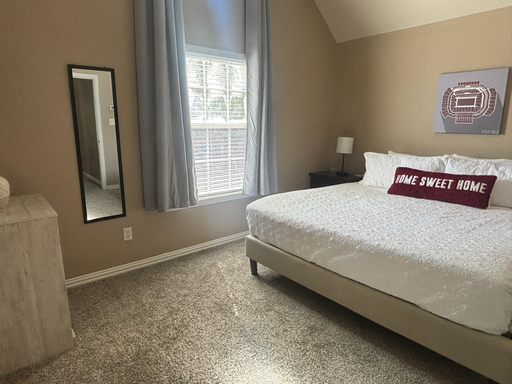 1001 Krenek Tap Road, Unit 2801 College Station, TX 77840 - Photo 10 of 12 a bedroom with a bed and a window