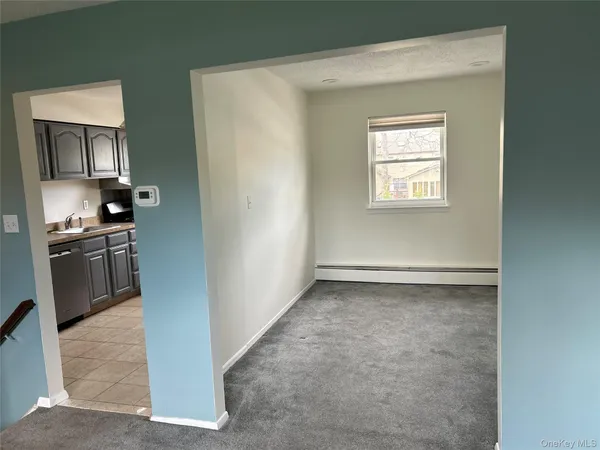 a view of a kitchen with a sink