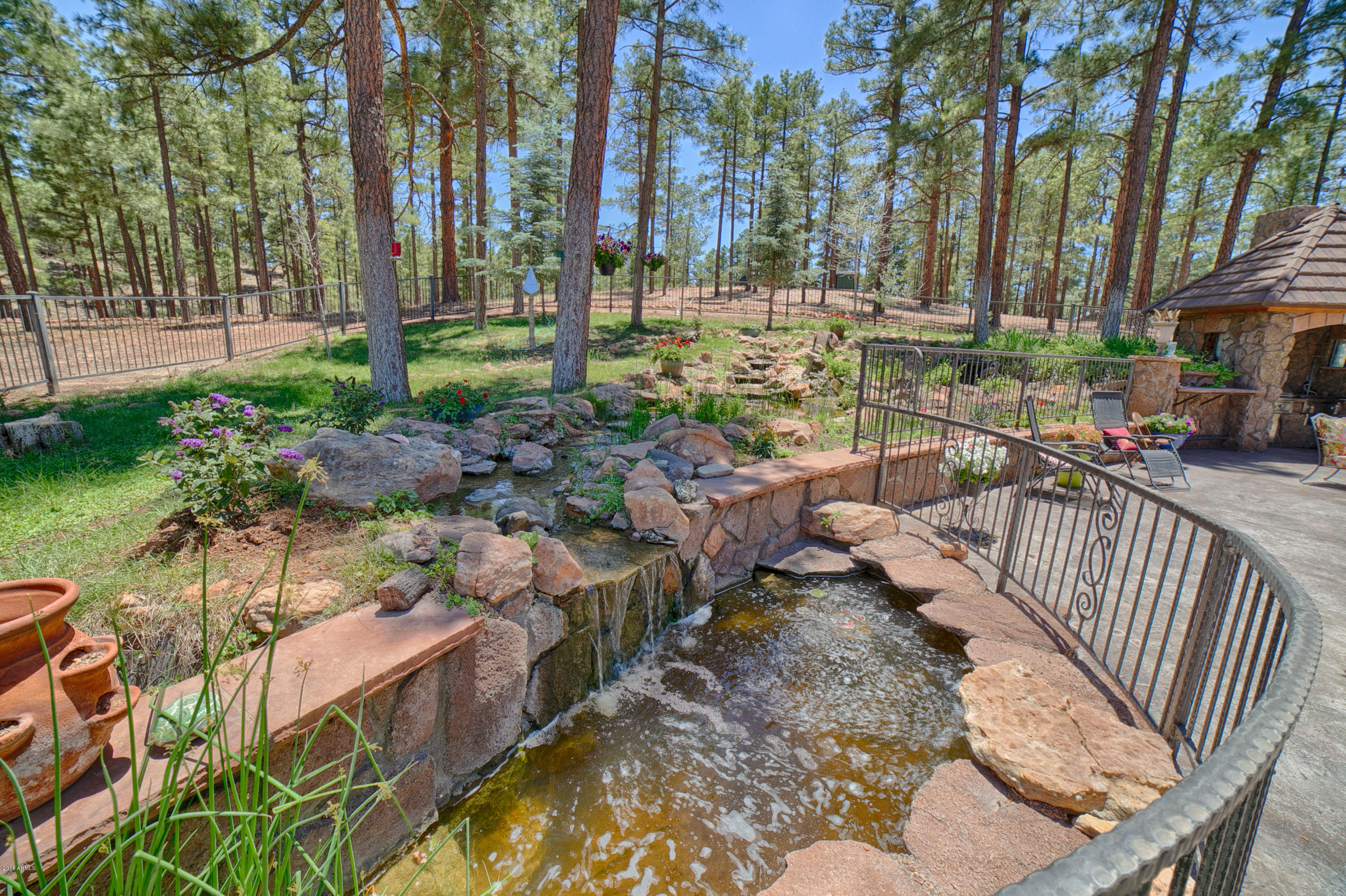 889 Neal Road Show Low, AZ 85901 - Photo 18 of 85 Water Feature in Backyard