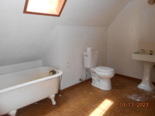 30528 Rl Smith Logging Road Oak Run, CA 96069 - Photo 16 of 22 a bathroom with a sink a toilet and bathtub