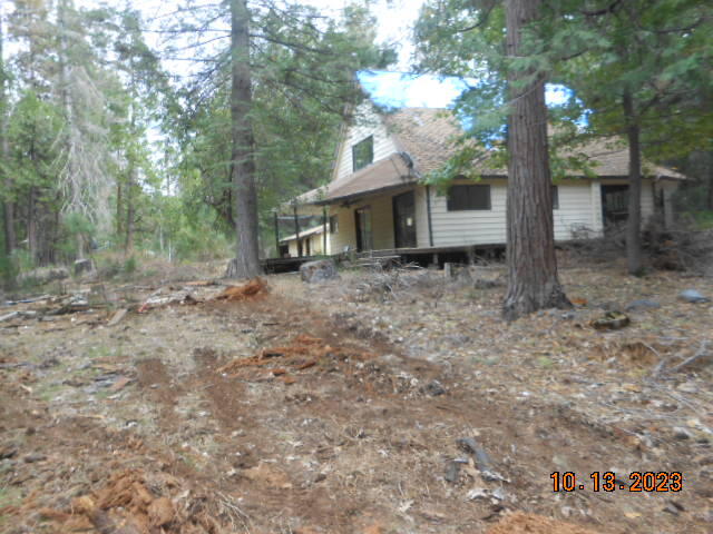 30528 Rl Smith Logging Road Oak Run, CA 96069 - Photo 18 of 22 a backyard of a house with lots of green space
