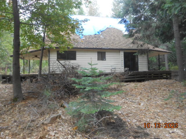 30528 Rl Smith Logging Road Oak Run, CA 96069 - Photo 20 of 22 a front view of a house with garden