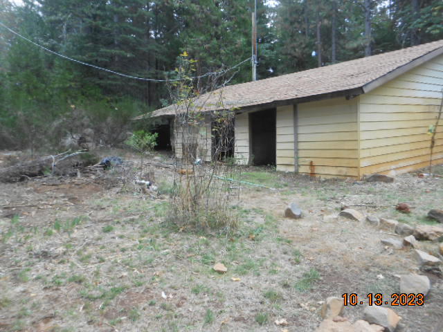 30528 Rl Smith Logging Road Oak Run, CA 96069 - Photo 22 of 22 a view of a house with a yard and garage