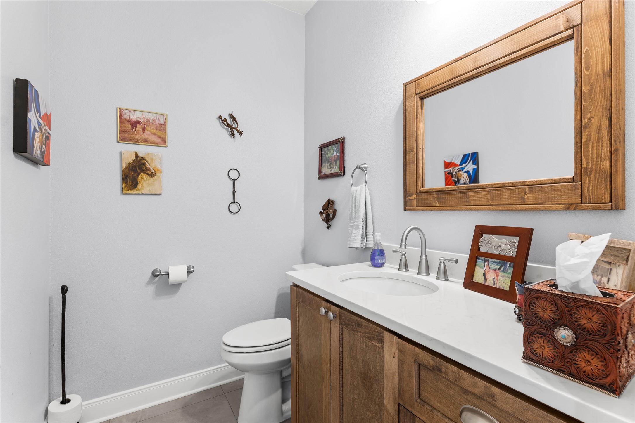 1434 Antioch Road Paige, TX 78659 - Photo 16 of 40 Hallway Half bath features vanity and is located off Kitchen area.