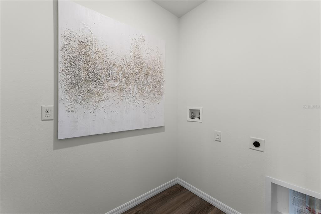 3390 Ft Mellon Lane Sanford, FL 32773 - Photo 10 of 24 a view of a small space with wooden floor in it