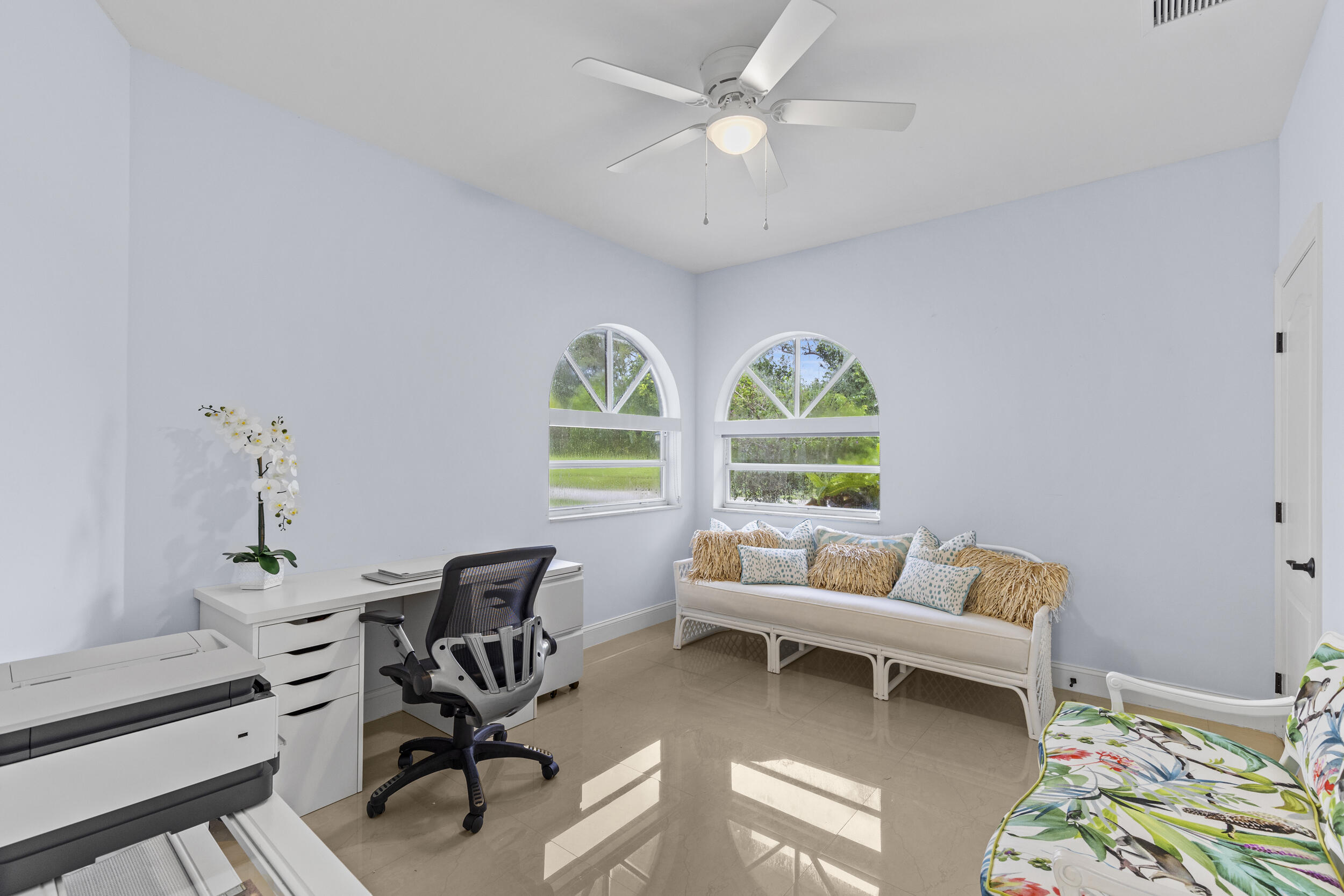 10431 Stonebridge Boulevard Boca Raton, FL 33498 - Photo 24 of 53 a living room with furniture and a window