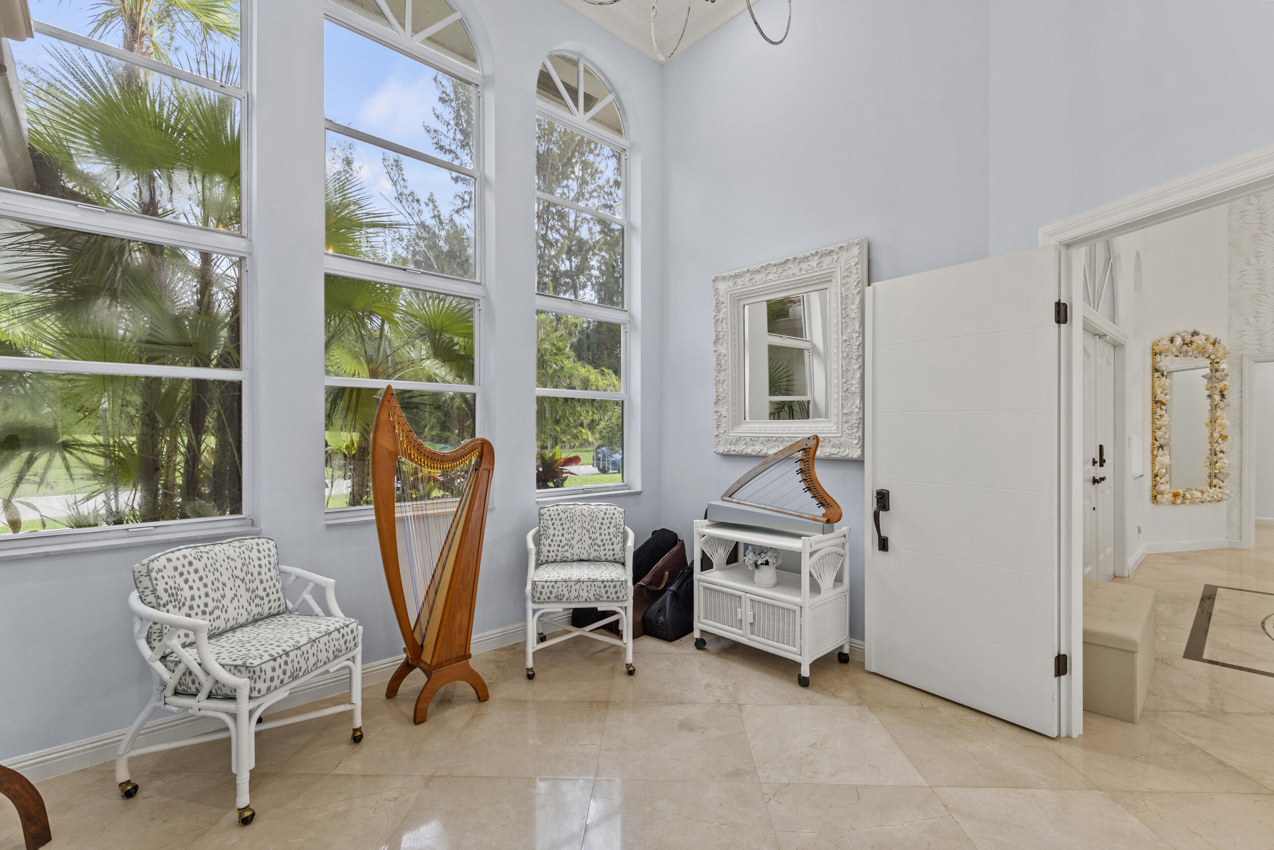 10431 Stonebridge Boulevard Boca Raton, FL 33498 - Photo 28 of 53 a view of a workspace with furniture and a window