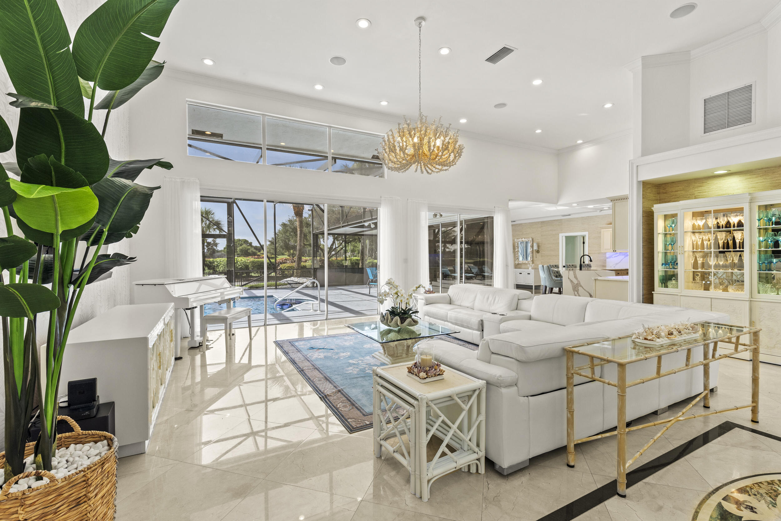 10431 Stonebridge Boulevard Boca Raton, FL 33498 - Photo 3 of 53 a living room with fireplace furniture and a potted plant