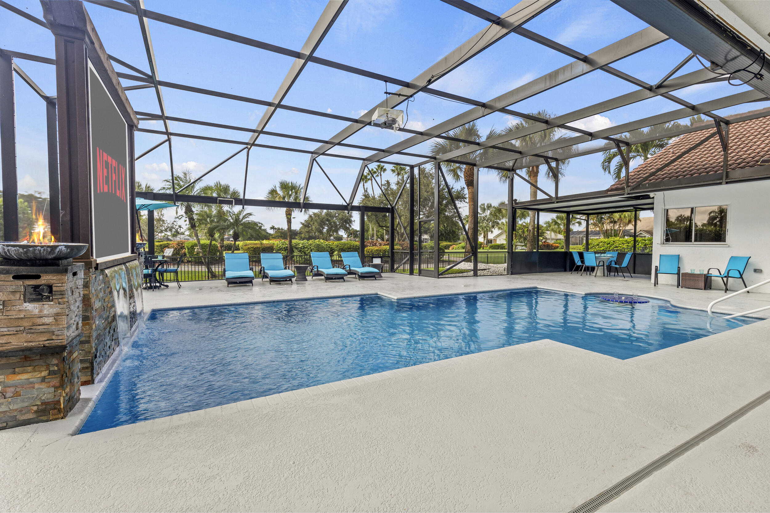 10431 Stonebridge Boulevard Boca Raton, FL 33498 - Photo 37 of 53 a view of a swimming pool with a patio