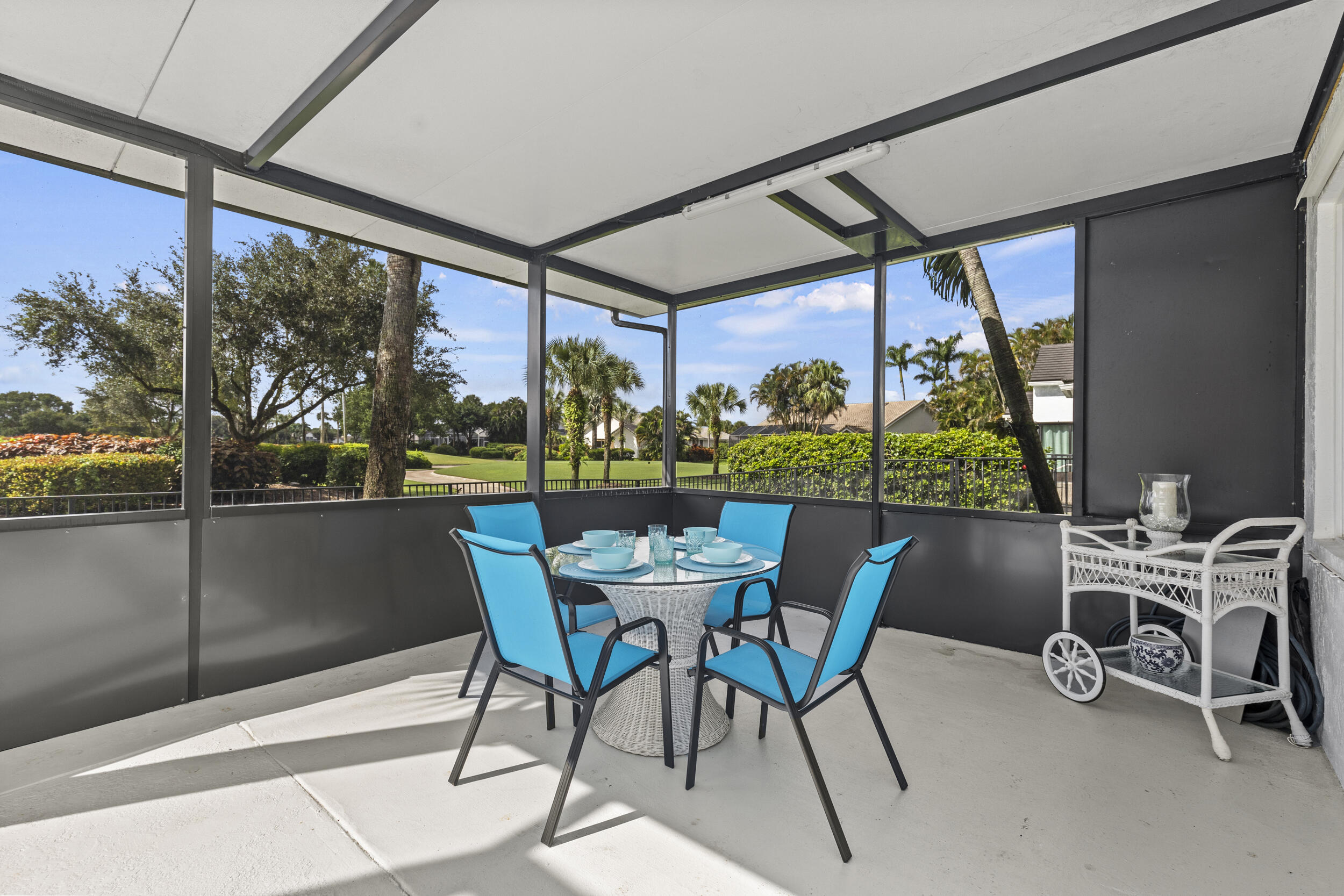 10431 Stonebridge Boulevard Boca Raton, FL 33498 - Photo 40 of 53 a dining room with furniture and outdoor view