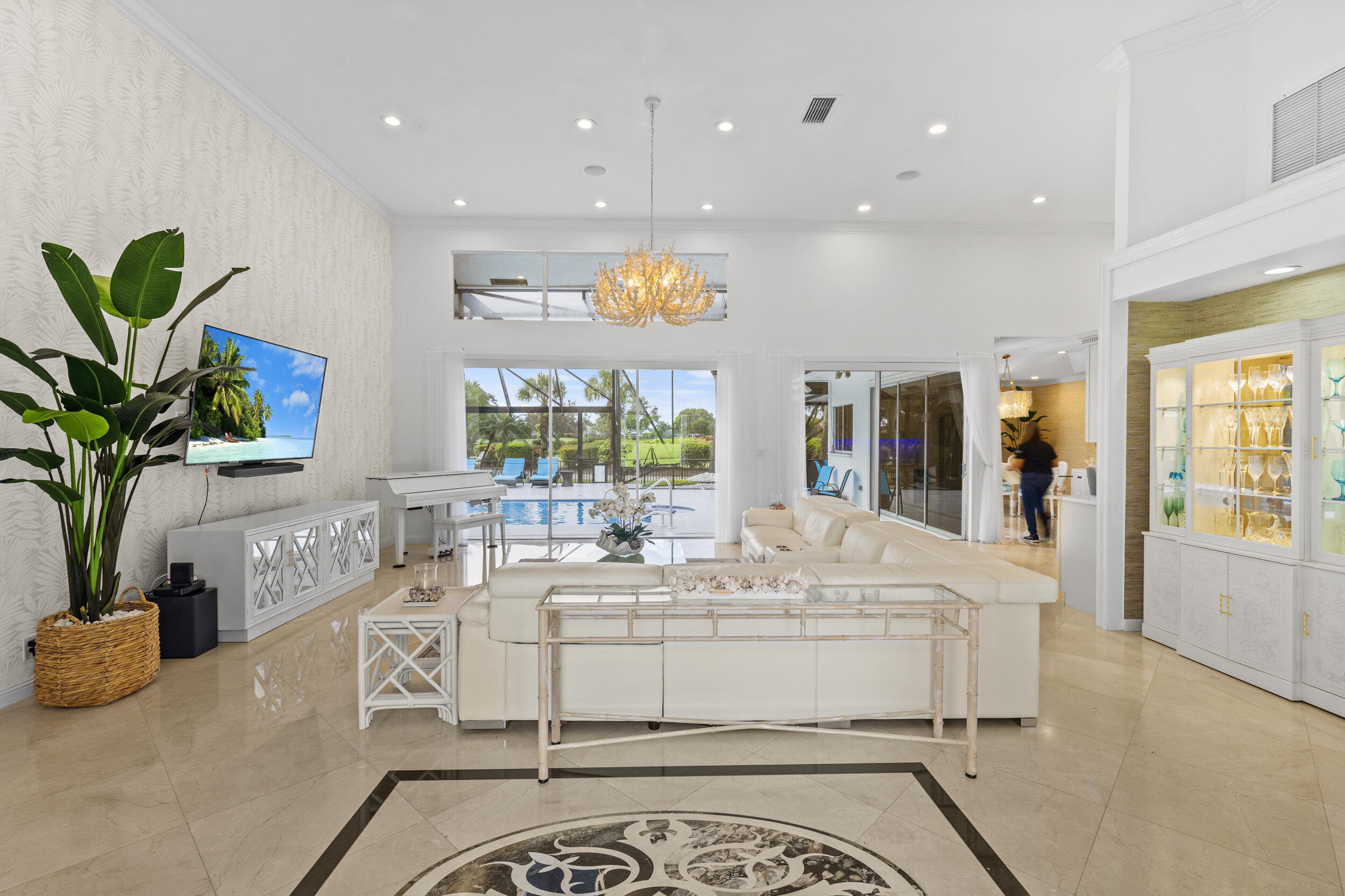 10431 Stonebridge Boulevard Boca Raton, FL 33498 - Photo 8 of 53 a living room with stainless steel appliances furniture and a large window
