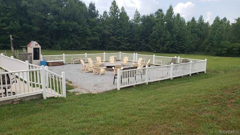 11944 Courthouse Road Victoria, VA 23974 - Photo 11 of 12 a view of a deck with a big yard and large trees