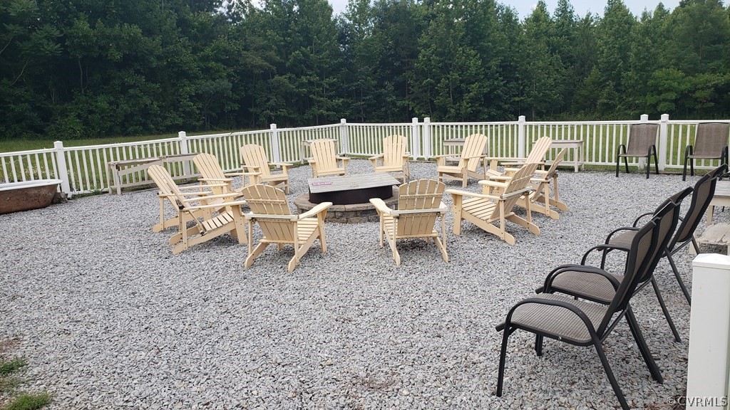 11944 Courthouse Road Victoria, VA 23974 - Photo 12 of 12 a view of a dinning table and chairs on the roof deck