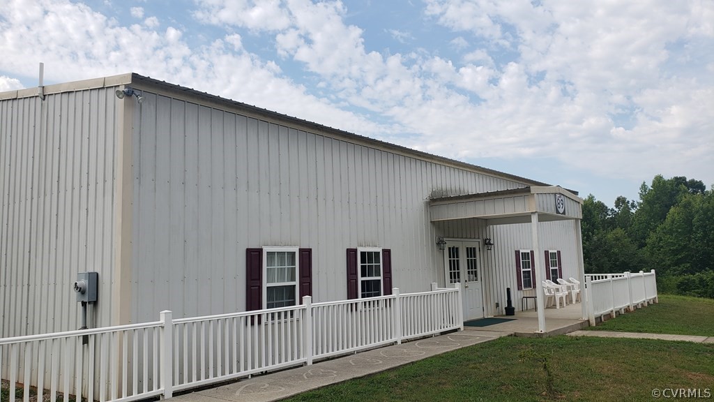 11944 Courthouse Road Victoria, VA 23974 - Photo 3 of 12 a backyard of a house with table and chairs