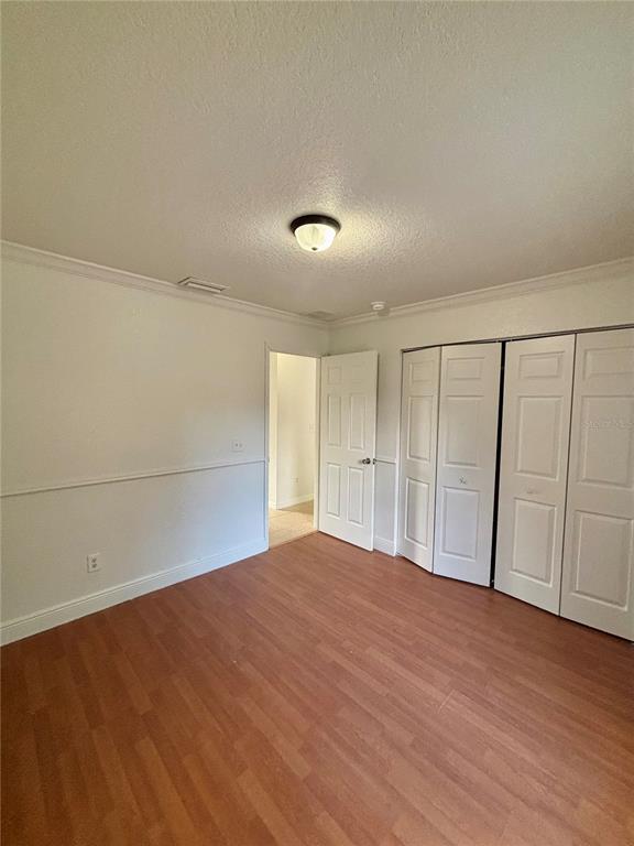 2825 Southwest 140th Court Ocala, FL 34481 - Photo 9 of 21 a view of empty room with wooden floor