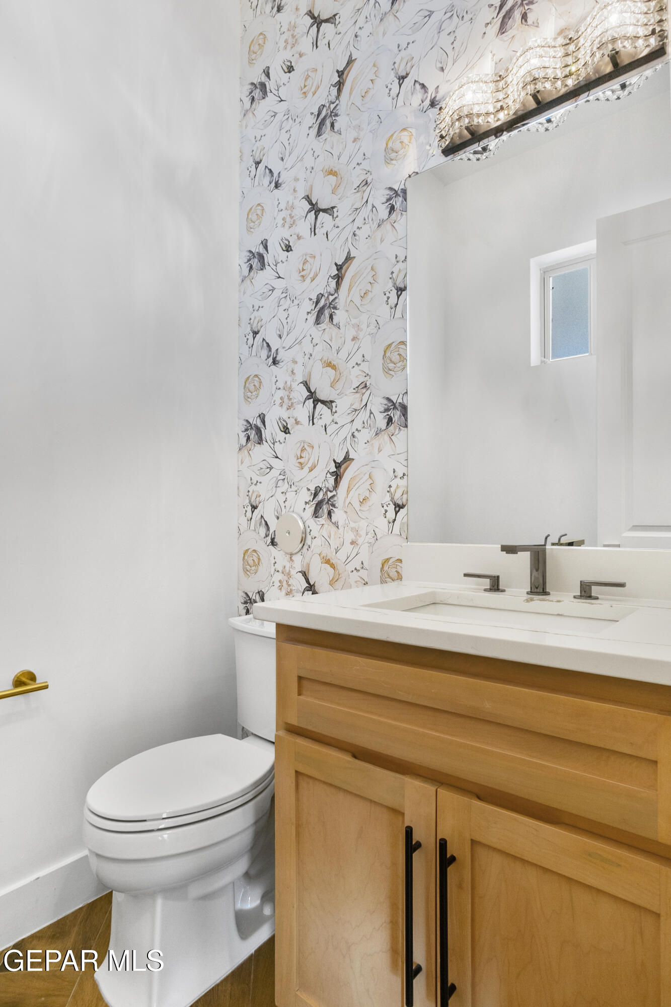 5699 Rio Bonito Circle El Paso, TX 79932 - Photo 15 of 25 a bathroom with a sink a toilet and mirror