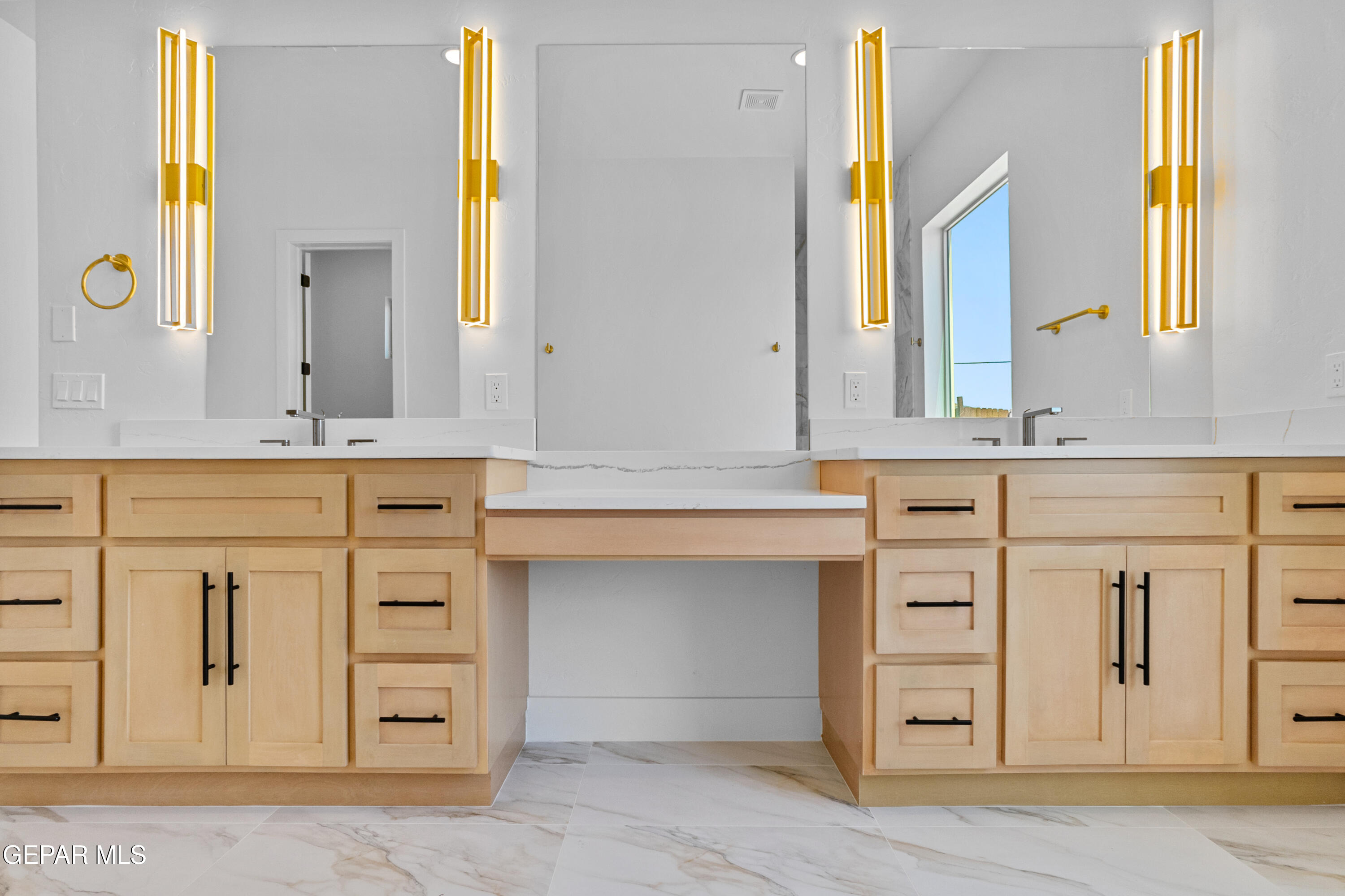 5699 Rio Bonito Circle El Paso, TX 79932 - Photo 19 of 25 a bathroom with a sink vanity and a mirror