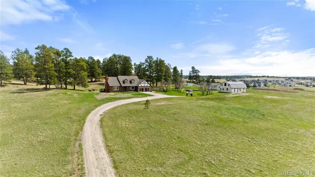 a view of a city with lawn chairs