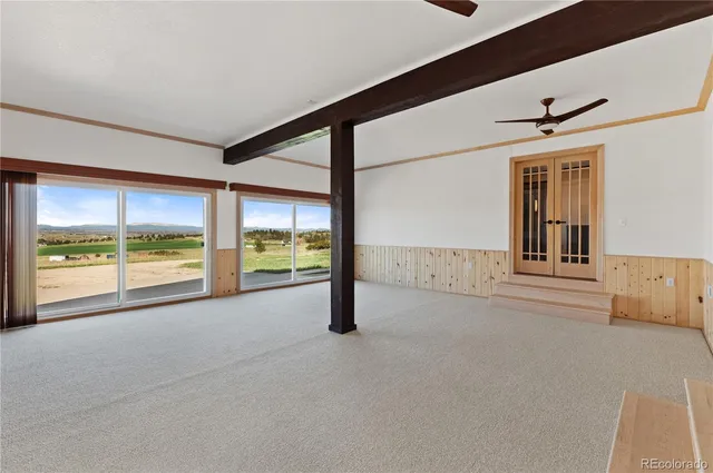 a bathroom with a shower curtain and a sink