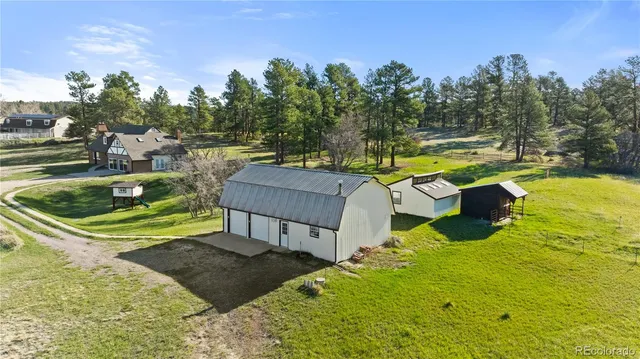 a view of a lake with a yard