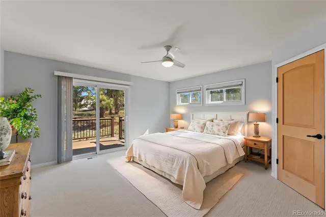 a work room with furniture and a flat screen tv