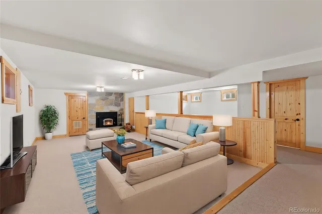 a bedroom with a bed and a dresser in it